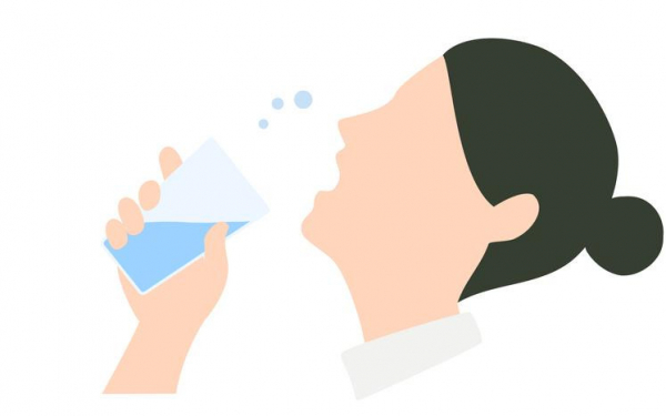 Illustration of a woman with black hair pulled into a bun, head tipped back, gargling with salt water to relieve sore throat from tonsil stones